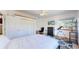 Bedroom with bed, large closet, telescope and an exterior view window at 11348 Ranch Elsie Rd, Golden, CO 80403