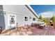 Outdoor deck with dining table, benches, grill, and wooded views creating ideal entertaining space at 11348 Ranch Elsie Rd, Golden, CO 80403
