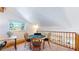 Upper level game room features an octagonal card table at 11348 Ranch Elsie Rd, Golden, CO 80403