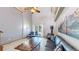 Spacious living room with fireplace, leather seating, and sliding glass door to deck at 11348 Ranch Elsie Rd, Golden, CO 80403