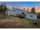 Charming home with a large deck perfect for outdoor gatherings and relaxation at 11348 Ranch Elsie Rd, Golden, CO 80403