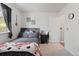 Bedroom with bed, closet, and dark accents at 3226 W Girard Ave # D, Englewood, CO 80110