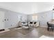 Living room with light walls, hardwood floors, and comfy furniture at 3226 W Girard Ave # D, Englewood, CO 80110