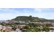 Scenic city view with buildings, trees, and the mesa mountain backdrop under a clear blue sky at 801 8Th St, Golden, CO 80401