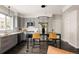 Modern kitchen with gray cabinets, stainless steel appliances, a center island, and pendant lighting at 801 8Th St, Golden, CO 80401