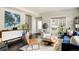 Comfortable living room with modern decor, a stylish credenza, and a blue velvet sofa at 801 8Th St, Golden, CO 80401