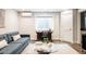 Cozy living space featuring a desk, comfortable seating, and sleek finishes with hardwood flooring at 801 8Th St, Golden, CO 80401