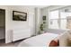 Comfortable main bedroom with a modern dresser and a large window at 801 8Th St, Golden, CO 80401