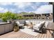 Relaxing deck space with mountain views and outdoor furniture, perfect for entertaining or enjoying the scenery at 801 8Th St, Golden, CO 80401