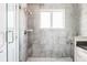 Modern tiled shower with glass door and sleek shower fixtures at 801 8Th St, Golden, CO 80401