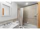 Clean bathroom with a shower/tub combo and updated vanity at 8010 W Chestnut Dr, Littleton, CO 80128