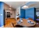 Bright dining area with seating for four, and views into the adjacent kitchen at 6839 E Briarwood Dr, Centennial, CO 80112