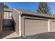 The attached two-car garage offers convenient parking and additional storage space at 6839 E Briarwood Dr, Centennial, CO 80112