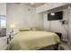 A well-lit bedroom with a large window view of an urban landscape at 891 14Th St # 2712, Denver, CO 80202