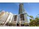 Modern high-rise building with sleek design and an array of shops at the base at 891 14Th St # 2712, Denver, CO 80202