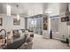 Bright living room featuring floor-to-ceiling windows and views of the city skyline at 891 14Th St # 2712, Denver, CO 80202