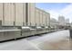 Rooftop outdoor kitchen featuring stainless steel gas grills and counter space at 891 14Th St # 2712, Denver, CO 80202