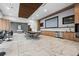 Spacious entertainment room with a large screen, kitchenette, and dining area at 891 14Th St # 2712, Denver, CO 80202