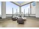 Modern rooftop terrace with stylish outdoor furniture, gas fireplace, and city views at 891 14Th St # 2712, Denver, CO 80202