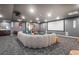 Home theater or media room with a large screen, projector, surround sound, and comfortable sectional seating at 891 14Th St # 2712, Denver, CO 80202