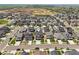 A beautiful aerial view of a neighborhood showcasing well-maintained homes and landscaping at 9759 Waco St, Commerce City, CO 80022