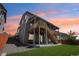 Backyard view showcases an elevated deck and outdoor space in a fenced yard at 9759 Waco St, Commerce City, CO 80022