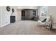 Finished basement area with carpet, cabinets and decor at 9759 Waco St, Commerce City, CO 80022