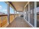 Spacious deck with wood flooring and wooden railings, perfect for entertaining and relaxation at 9759 Waco St, Commerce City, CO 80022