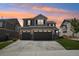 Charming two-story home with a three-car garage and well-maintained landscaping at 9759 Waco St, Commerce City, CO 80022
