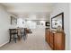 Spacious carpeted basement features a dining area and ample space for various activities at 16662 W 61St Pl, Arvada, CO 80403