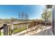 View from back deck showcasing the grassy backyard, walking path, and natural open space at 9567 W 107Th Dr, Broomfield, CO 80021
