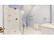 Bathroom showcasing a glass shower, toilet, vanity with bright lighting at 9567 W 107Th Dr, Broomfield, CO 80021