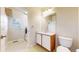 Bright laundry room with washer, dryer, and ample storage space at 9567 W 107Th Dr, Broomfield, CO 80021