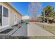 Cozy backyard with a patio, chairs, and a view of the well-maintained lawn and fence at 12500 Meade Ct, Broomfield, CO 80020