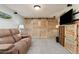Basement area with a sofa and entertainment center at 12500 Meade Ct, Broomfield, CO 80020