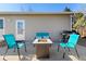 Inviting patio area with a fire pit, seating, and a grill for outdoor gatherings at 12500 Meade Ct, Broomfield, CO 80020