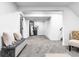 Spacious hallway with seating, a full-length mirror, and ample storage at 544 S Victor Way, Aurora, CO 80012