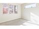 Well-lit bedroom featuring a large window and neutral walls at 2471 Quitman St, Denver, CO 80212