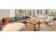 Bright living room with stylish furniture, large windows, and views of the outdoors at 2907 Hiwan Dr, Evergreen, CO 80439