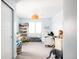 Bright, playful bedroom featuring a window, toys and light blue walls at 2540 S Monroe St, Denver, CO 80210