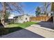 Backyard featuring a lawn and detached structure at 1111 S Corona St, Denver, CO 80210