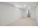 Unfinished basement with carpet flooring ready for customization at 1111 S Corona St, Denver, CO 80210
