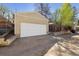 Detached garage with a large door at 1111 S Corona St, Denver, CO 80210
