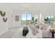 Bright main bedroom with a walkout to a deck, neutral colors and amazing mountain views at 9566 Poppy Way, Arvada, CO 80007
