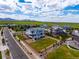 Elevated shot of a residential area featuring beautifully landscaped yards and scenic surroundings at 9566 Poppy Way, Arvada, CO 80007
