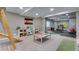 Finished basement featuring gym with glass wall, toys, and recessed lighting at 11817 Phoebe St, Parker, CO 80134