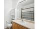 Cozy bathroom featuring a single sink vanity and shower with curtain at 18846 E Yale Cir # A, Aurora, CO 80013