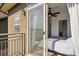 Bedroom and balcony featuring a sliding glass door to the outdoor view and relaxing space at 18846 E Yale Cir # A, Aurora, CO 80013