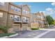 Townhome community featuring private garages, balconies, and tasteful landscaping at 18846 E Yale Cir # A, Aurora, CO 80013