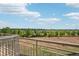 Balcony view showcasing a serene landscape and blue skies at 18846 E Yale Cir # A, Aurora, CO 80013